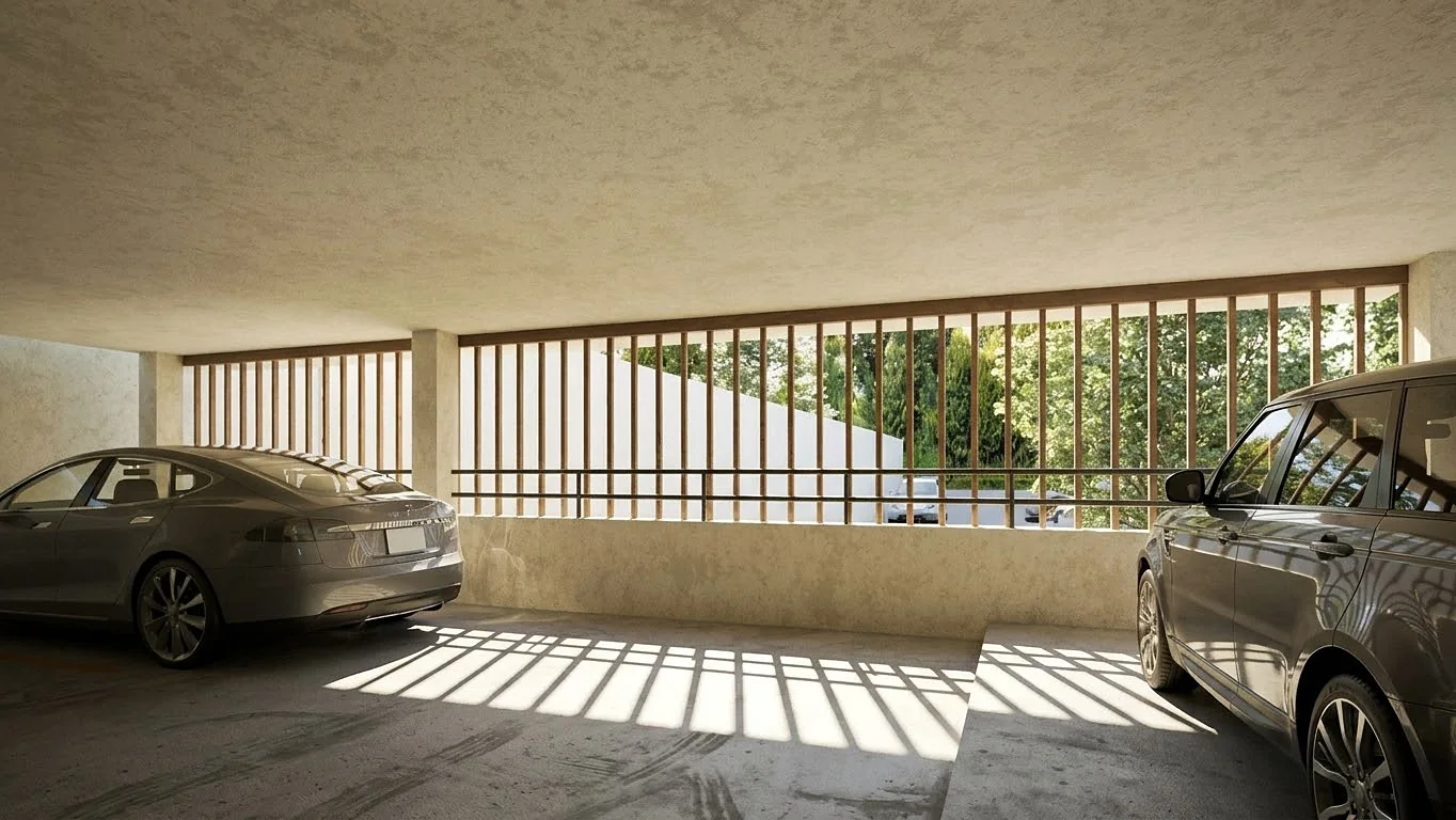 Estacionamiento techado con luz natural entre la celosía